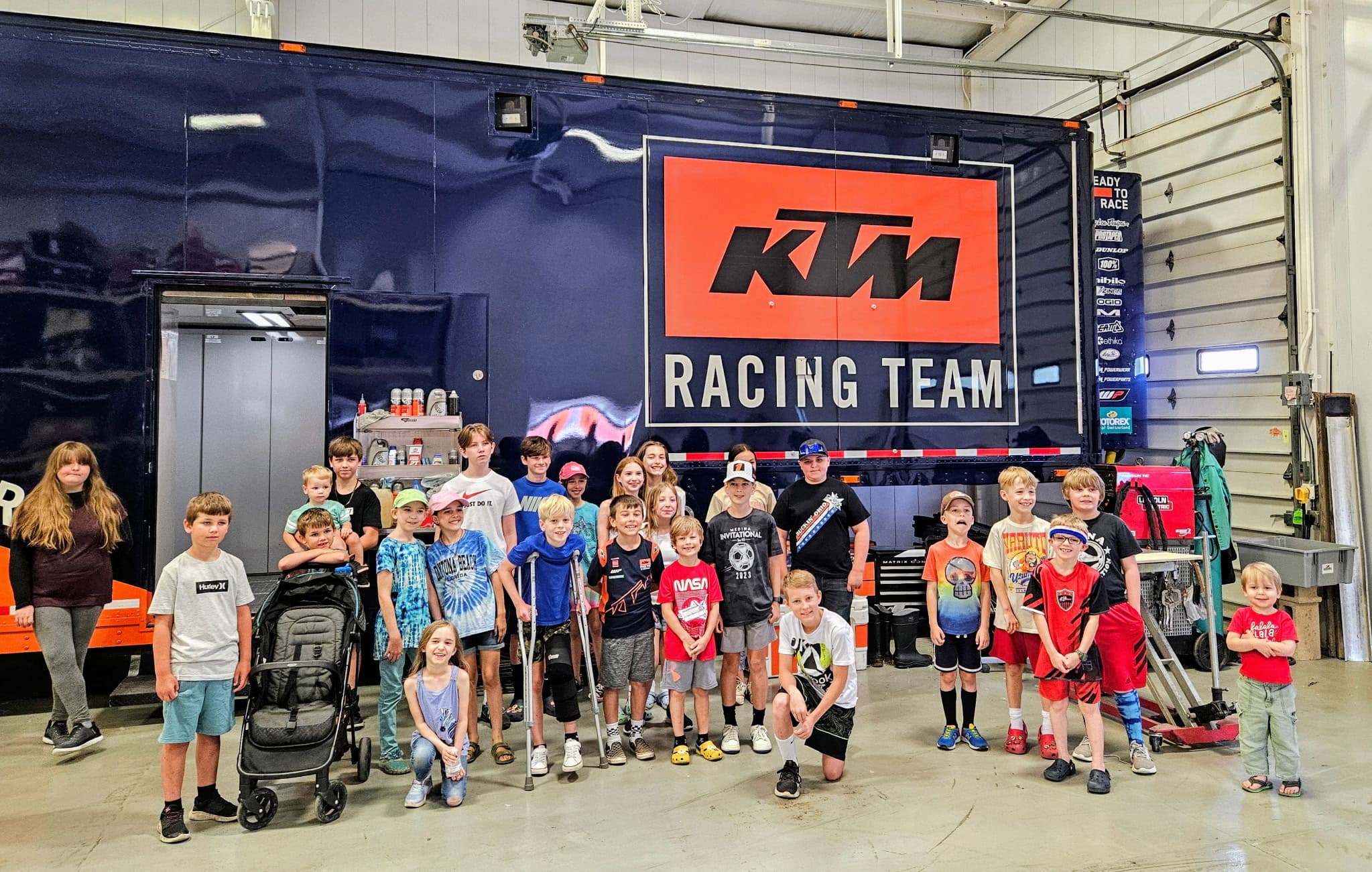 MedinaCHF kids on a field trip to a racing team shop